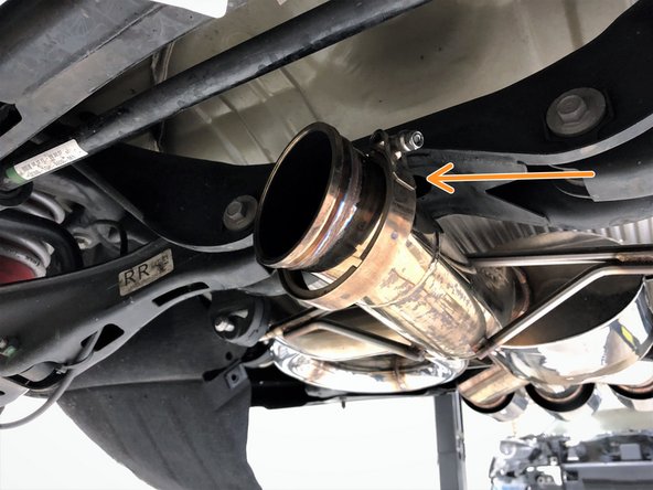 Slide one of the supplied v-band clamps over the end of the 27WON muffler section in the approximate orientation shown