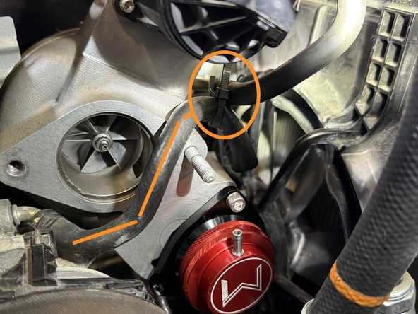 Optional: use a zip tie (not included) to secure coolant line out of the way as shown