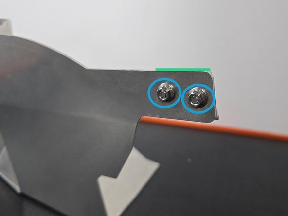 The top of the bracket should be flush with the top of the shroud