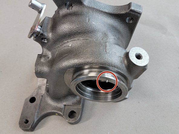 Ensure the pin on the turbine housing and the hole on the CHRA align when you press them together