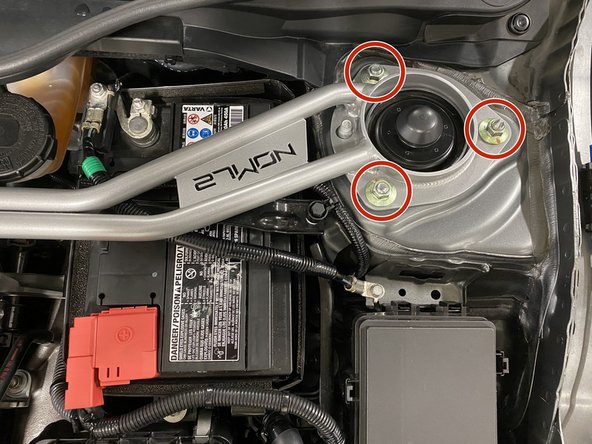 Install the three (3) OEM flange nuts