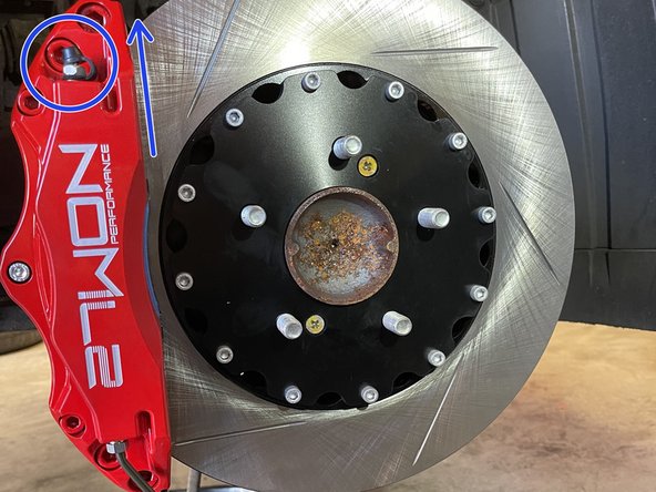 Ensure the bleeders are pointing up when installing your 27WON calipers as shown