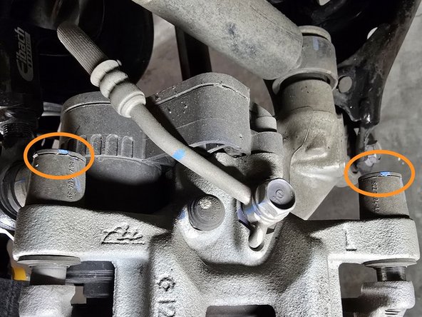 Move to the back side of the caliper for the removal process