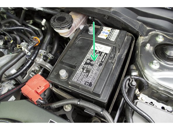 Set the battery on the tray and in the foam