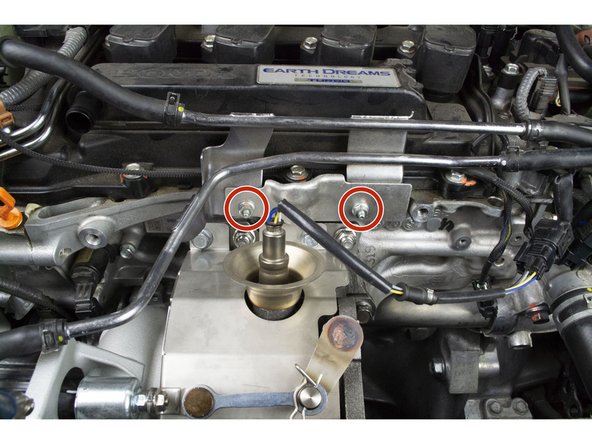 Install the upper coolant hard lines support bracket and shield that was removed.  Use a 10mm socket &amp; torque wrench to install the two (2) 10mm nuts and torque to 8-10 ft-lbs