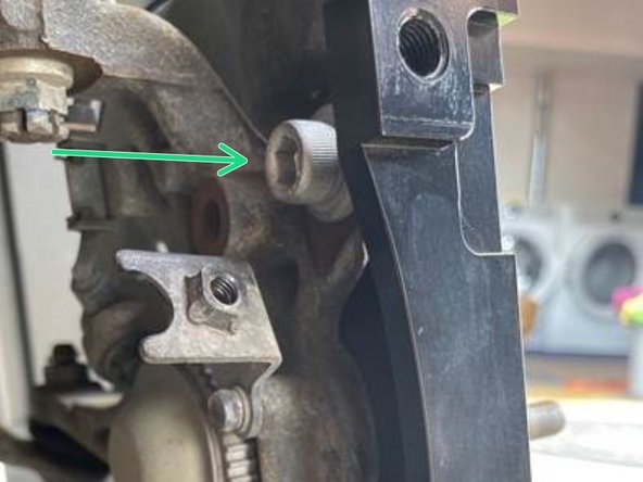 Apply Loctite to the (2) short cap bolts before installing