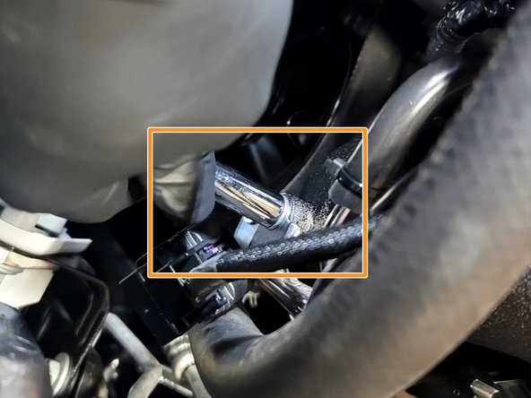 Attach Vacuum line bracket to TIP with provided M5 flange bolts using finger and 8mm socket to set the bolts