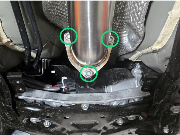Reinsert the front hanger to the chassis hanger as shown