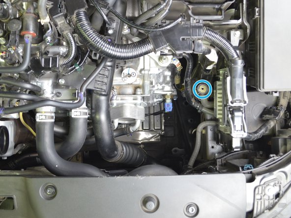 Locate threaded hole in the bracket for Automatic transmissions