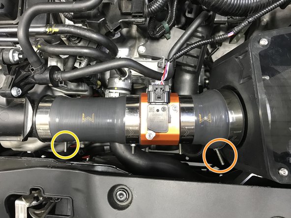 If needed, rotate the MAF &amp; Silicone assembly so the MAF sensor and &quot;W&quot; are facing upward as shown