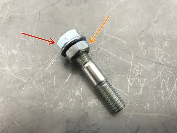 Thread on the provided M8x1.25 nut onto the OEM stud in your OEM turbo, this is shown off the turbo for clarity