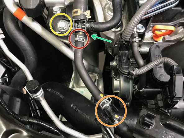 Use pliers to loosen the spring clamp.  Slide the clamp towards the center of the  of the hose