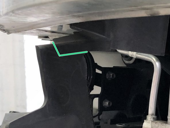 Locate the area in yellow on the passenger's side shroud