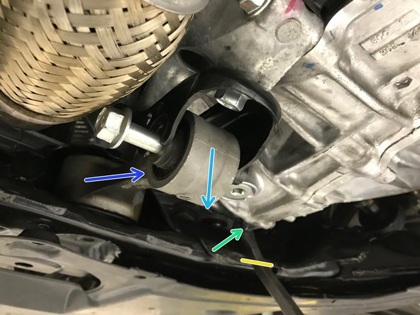 Place the pry bar on the chassis as shown