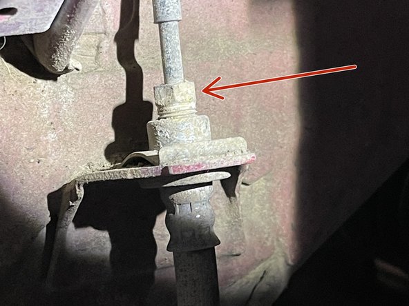 Use small vice grip pliers to remove the mounting clip holding the OEM brake line