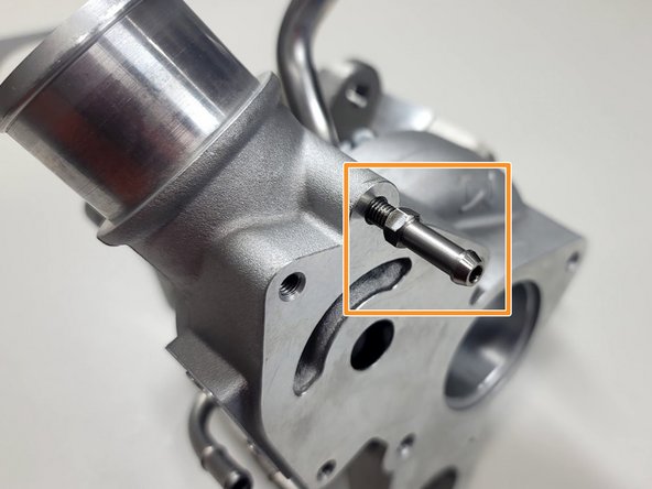 Install provided nipple using 8mm wrench until snug