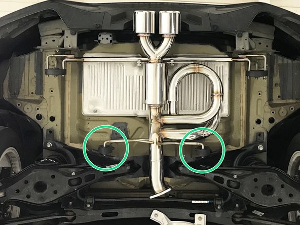 Insert both forward hangers as shown