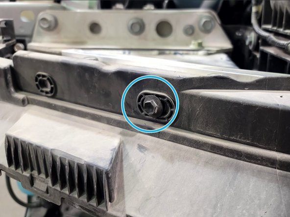 Reinstall two (2) bolts using a 10mm socket and ratchet