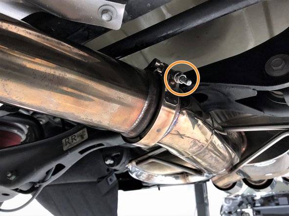 Finally, tighten the rear mid-section to muffler section v-band clamp using a 10mm socket and ratchet. Torque to 8-12 lb-ft