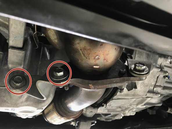 Use a 14mm socket or wrench to install the four (4) 14mm bolts and brackets.  Torque to 38-42 ft-lbs