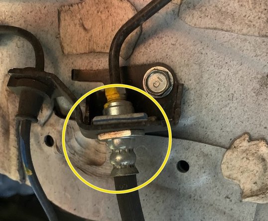 Locate the chassis side brakeline connection