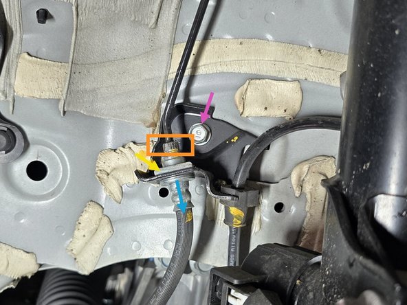 Use a 10mm line wrench to loosen the threaded brake line connection (shown with orange box) then pull chassis side brake line from the connection
