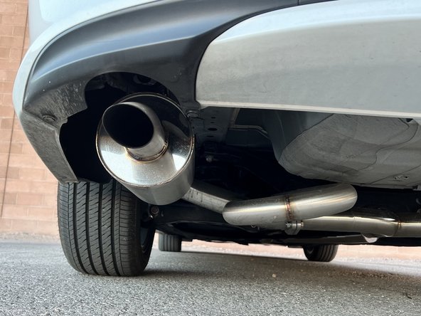 If the tips are sitting high, there may be a rubber hanger that is upside-down. Verify that all hangers are oriented correctly