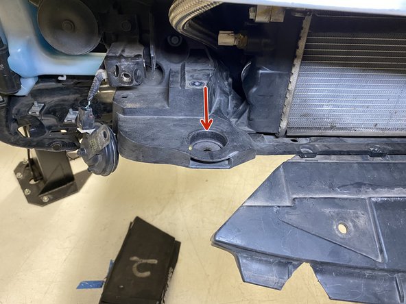 The rubber mounts will fit into the mounting pockets shown with the red arrows