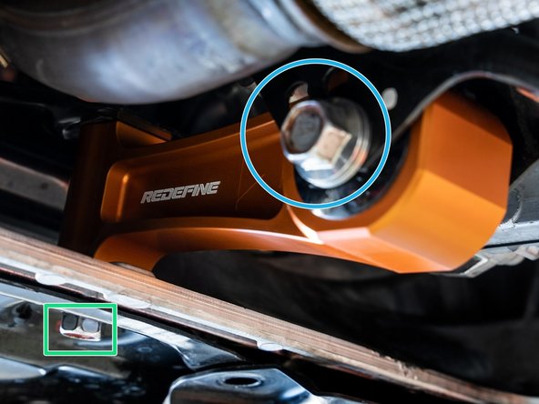 Use a 17mm socket and torque wrench to torque rear bolt to 65lb-ft