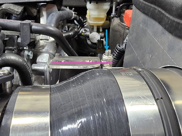 Rotate the silicone on the MAF housing until the filer is sitting close to the center of the shroud hole