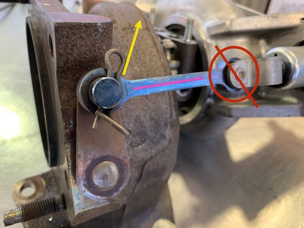 Using a pair of pliers, remove the retainer clip for the Electronic Wastegate