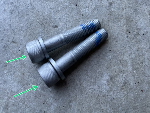 Apply blue Loctite on  (2) M8 long socket cap bolts
