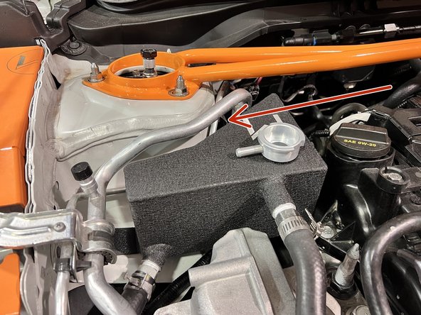 The plane of this mount is at an odd angle. Use extra caution not to cross thread. Washer not shown