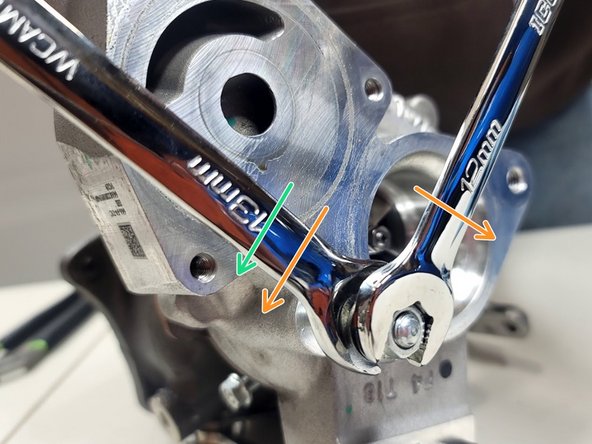 Tighten both nuts into each other as shown