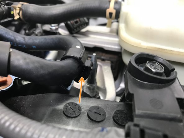 Lift the whole assembly up and set it on the valve cover out of the way