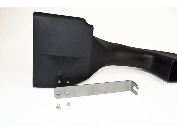 Using a 8mm socket and ratchet, install the bracket as shown