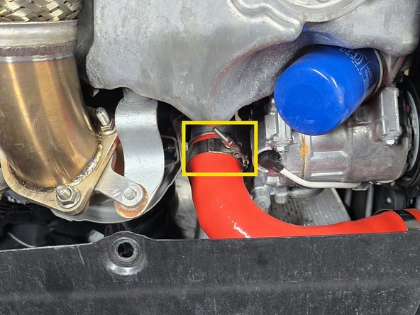 Correctly position the 60-68mm clamp on the turbocharger and tighten with a 10mm socket and 3/8" drive ratchet until the silicone starts to bulge slightly at the edge of the clamp