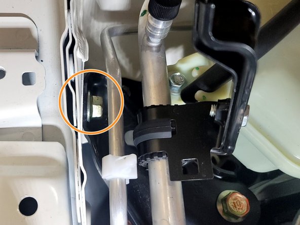 Remove bracket from the vehicle and set aside for reinstallation later