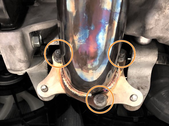 Reinstall the OE rubber hanger onto the hanger rod as shown