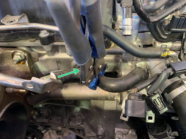 Pull upper coolant hose off of hard line