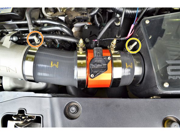 If needed, rotate the Race MAF &amp; Silicone assembly so the MAF sensor and &quot;W&quot; are facing upward as shown