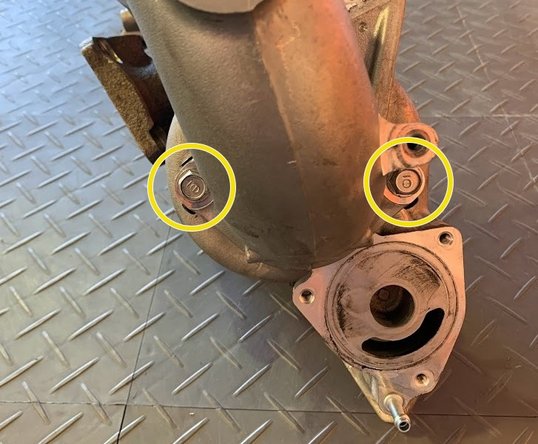 To demonstrate the location of the mounting screws, the turbo inlet pipe is shown off the car