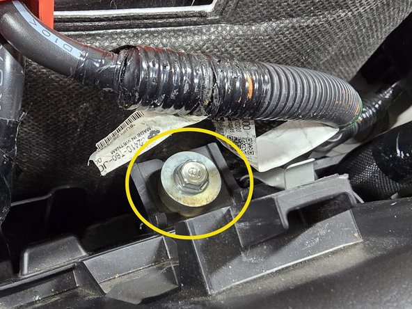 Use a 3/8&quot; rachet, a long extension, and a 10mm socket to remove the upper battery bracket bolt