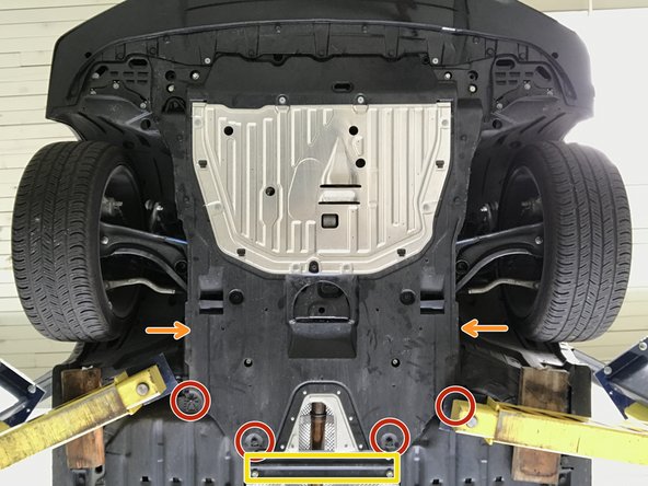 Locate the engine under tray to gain access to the connection between the front-pipe and down stream exhaust