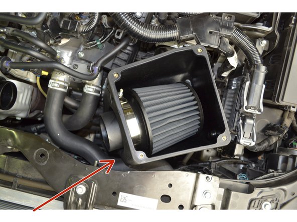 Lower the 27WON airbox into the engine in the orientation shown.