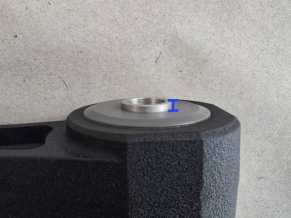 By hand insert the steel sleeve into the poly bushing as shown