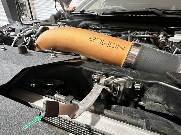 Make sure hood latch is high enough to  use. Rubber cover should be sticking up above the surface of the shroud