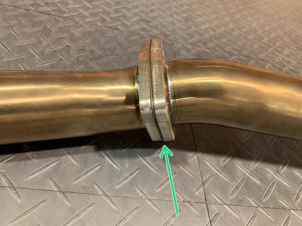 Align the flanges as shown