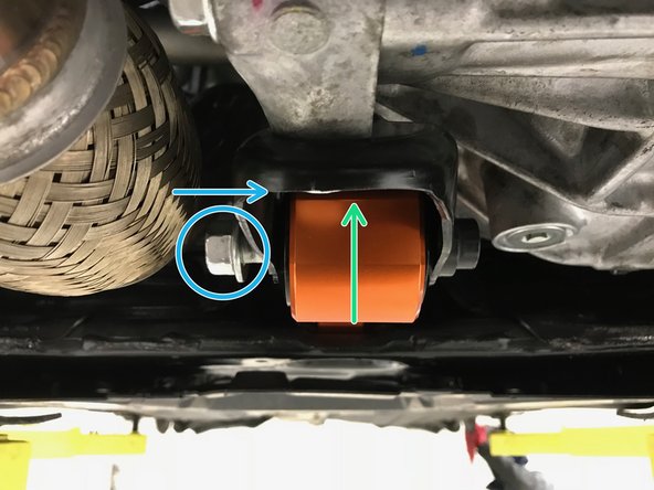 Rotate the RMM up and into the engine mounting bracket - the partially installed bolt will align with the slot in the engine side mounting bracket
