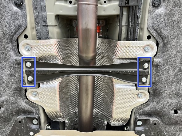 Reinstall the 4x 12mm bolts for the chassis brace and torque to 20 ft/lbs